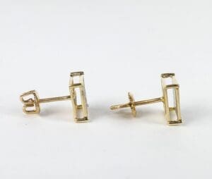 Gold rectangular earrings with screw-back posts.