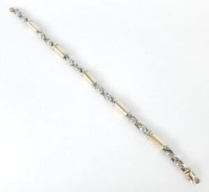 Silver and gold chain link bracelet.