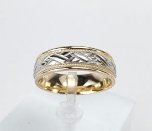 Two-tone gold and silver wedding ring.