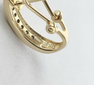Gold ring with unique geometric design.