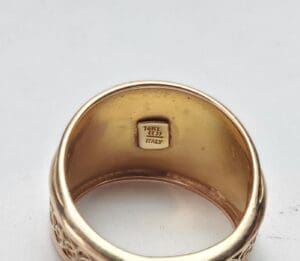 Gold ring with Italy hallmark inside band.