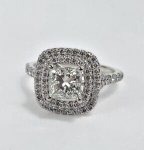 Square diamond ring with double halo setting.