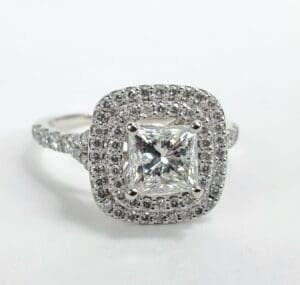 Square diamond ring with double halo setting.