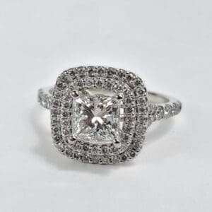 Square diamond ring with double halo setting.