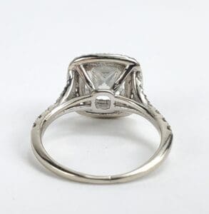 Diamond engagement ring with intricate setting.