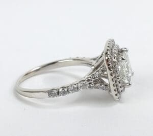 Diamond engagement ring with intricate detailing.