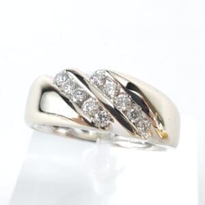 Silver ring with diamond accents.