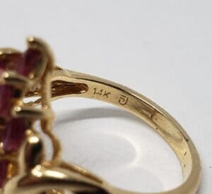 Gold ring with "14K" engraving.