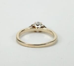 Gold ring with a diamond setting.