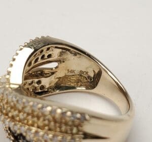 Gold ring with 14K SOL marking inside.