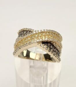 Multi-colored diamond crossover band ring.