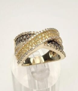 Gold ring with intertwined diamond bands.