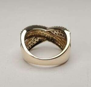 Gold ring with intricate interior design.