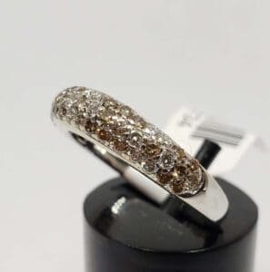 Silver ring with brown and clear stones.