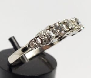Silver ring with multiple sparkling stones.