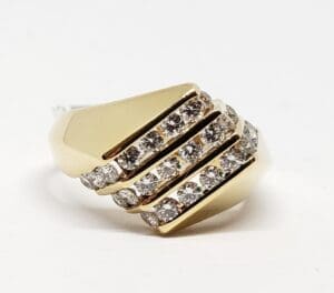 Gold ring with multiple diamond rows.