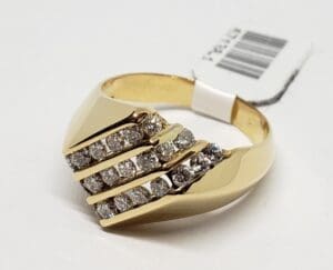 Gold ring with multiple diamond rows.