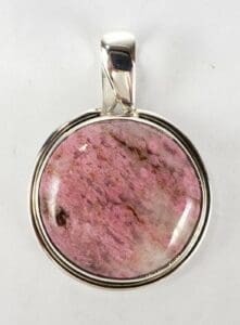 Pink stone pendant with silver setting.