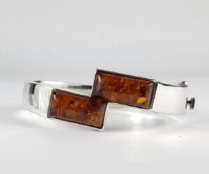 Silver bracelet with rectangular amber stones.