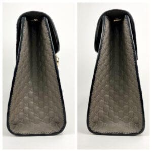 Side view of a patterned designer handbag.