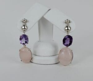 Purple and pink gemstone drop earrings.