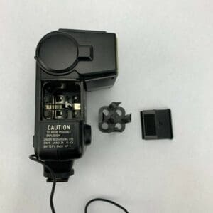 Camera battery pack with cover removed.