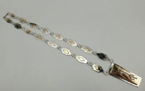 Silver and gold geometric link necklace.