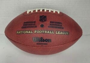 NFL football with Wilson branding displayed.