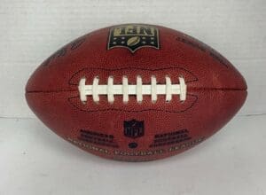 Official NFL football on plain background.