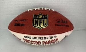 NFL football presented to Preston Parker.