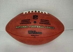 NFL football with Wilson branding.