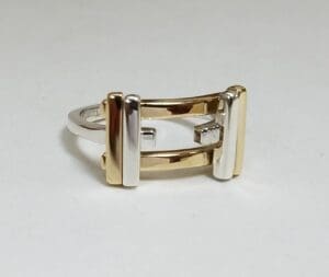 Gold and silver ring on display.
