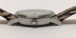 Side view of a wristwatch with strap.