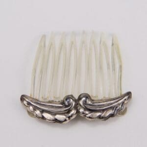 Decorative hair comb with silver accents.