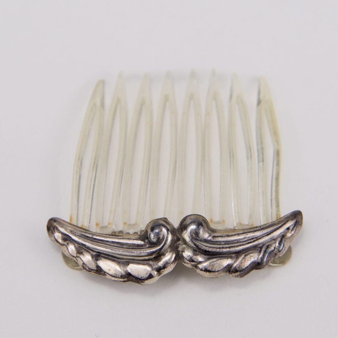 Decorative hair comb with silver accents.