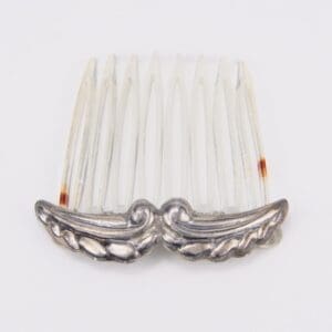 Decorative hair comb with silver accents.