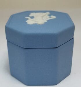 Blue octagonal box with white design.