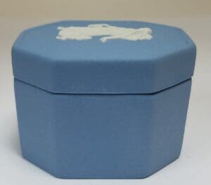 Blue octagonal box with white design.