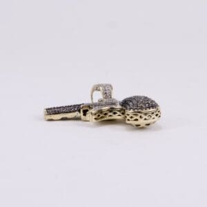 Gold and silver diamond-studded pendant.