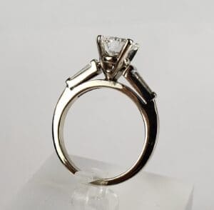 Diamond ring with a three-stone setting.