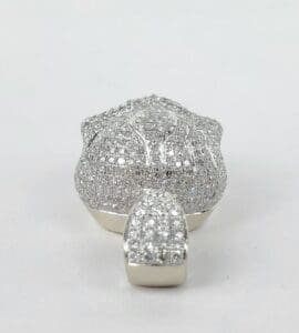 Diamond-encrusted jewelry piece on display.