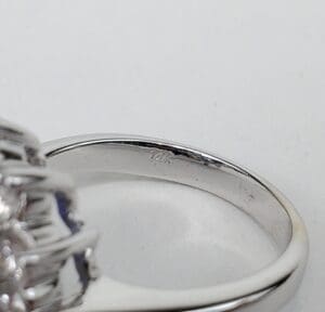Silver ring with intricate design details.