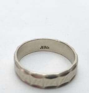 Silver ring with 14K mark inside.