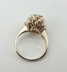 Gold ring with intricate gemstone setting.