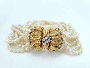 Gold clasp with pearls and diamonds.