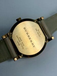 Back of Burberry watch with leather strap.