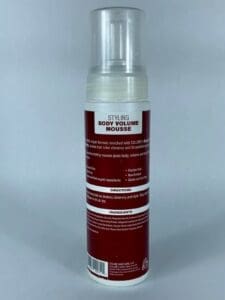 Styling body volume mousse bottle, white background.
