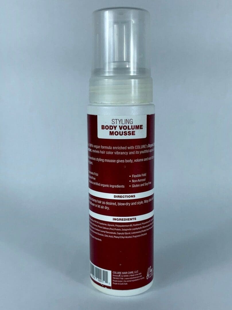 Styling body volume mousse bottle, white background.