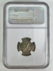 Graded coin in protective display case.