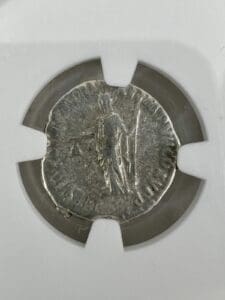Ancient silver coin with standing figure.